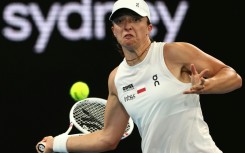 Poland’s Iga Swiatek hits a return to Australia’s Maya Joint