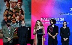 Director Annemarie Jacir with members of the cast