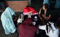 Relatives of prisoners waited anxiously for news of their loved ones outside El Rodeo 1 prison, east of Caracas