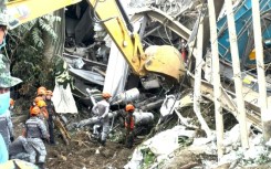 Philippines: Rescue workers search for dozens missing after landfill collapse