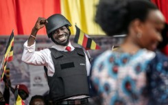 Opposition leader Bobi Wine has appeared in a flak jacket throughout the campaign to highlight the violence of the state
