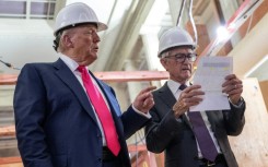 Donald Trump (L) has relentlessly pressured Jerome Powell (R) to lower US interest rates