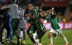 Tensions spilled over at the end of Saturday's Africa Cup of Nations quarter-final between Algeria and Nigeria, which the Super Eagles won 2-0 in Marrakesh