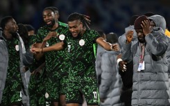 Alex Iwobi celebrates with teammates after Nigeria's AFCON quarter-final win over Algeria in Marrakesh on Saturday
