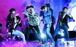 BTS performs onstage during the 2018 Billboard Music Awards at MGM Grand Garden Arena