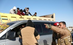 Damascus has accused the SDF of preventing people from leaving