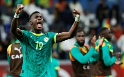 Senegal's Moussa Niakhate celebrates after the 2022 champions beat Egypt in the semi-finals