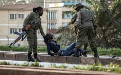 Uganda voted under heavy security presence