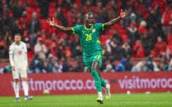 Match-winner Pape Gueye celebrates after Senegal won the 2025 Africa Cup of Nations final against Morocco