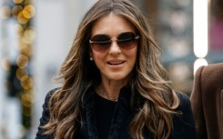 Hurley, wearing a dark green dress, repeatedly became tearful and struggled to speak as she defended her claim