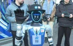 Robots parade through streets of Davos
