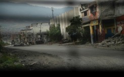 A deserted street in Port-au-Prince as seen from a police patrol vehicle