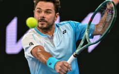 Stan Wawrinka hits a shot against Taylor Fritz