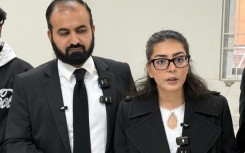Human rights lawyer Imaan Mazari (R) with her husband and fellow lawyer Hadi Ali Chattha (L) were handed 10-year prison terms for anti-state social media posts