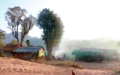 Hundreds live at the camp, a scattering of bamboo structures perched in a mountain valley
