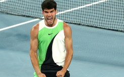 Spain's Carlos Alcaraz celebrates victory over Australia's Alex de Minaur