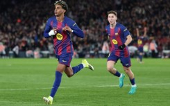 Barcelona's Spanish forward Lamine Yamal celebrates scoring a spectacular goal against Real Oviedo