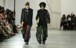 Models at Walter Van Beirendonck's show in a disused university building