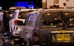 Hearses carrying the bodies some of the 15 passengers killed in the plane crash arrive at La Playa de Belen