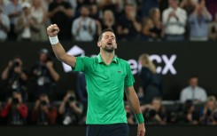 Serbia's Novak Djokovic celebrates victory over Italy's Jannik Sinner