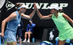 Belgium's Elise Mertens (L) and partner China's Zhang Shuai won the Australian Open women's double title