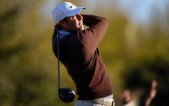 Top-ranked Scottie Scheffler hits a tee shot on the second hole during a practice round for the PGA Phoenix Open