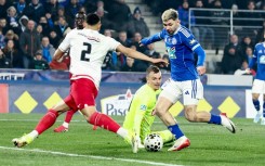 Julio Enciso (R) lines up his first goal after dribbling round Monaco goalkeeper Philipp Koehn