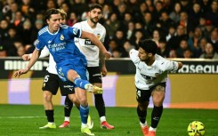 Real Madrid defender Alvaro Carreras slipped home midway through the first half to fire the visitors ahead at Valencia's Mestalla stadium