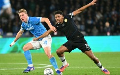 Chelsea's French defender Wesley Fofana (R)