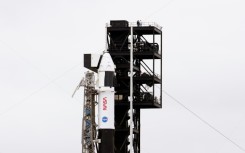 A SpaceX Falcon 9 rocket with the company's Dragon spacecraft on top is seen on the launch pad at Space Launch Complex 40 as preparations continue for the Crew-12 mission to the ISS