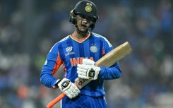 India's Abhishek Sharma walks back to the pavilion after his dismissal for a duck against Pakistan