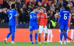 Real Madrid's Vinicius Junior (L) accused Benfica's Gianluca Prestianni (C) of calling him a 'monkey'