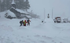 Rescuers were searching for ten people caught up in an avalanche in the Sierra Nevada mountains