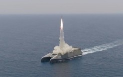 Iran's Revolutionary Guards were conducting war games in Strait of Hormuz, a vital conduit for oil and gas