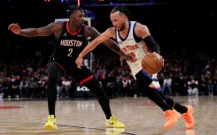 New York's Jalen Brunson drives against Dorian Finney-Smith in the Knicks' NBA win over the Houston Rockets