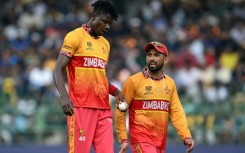 Zimbabwe captain Sikandar Raza (right) and quick bowler Blessing Muzarabani