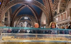 Pilgrims flock to Assisi as 800-year-old remains of Saint Francis go on display
