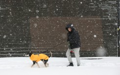 Authorities in New York, New Jersey and Rhode Island issued travel restrictions and shut schools