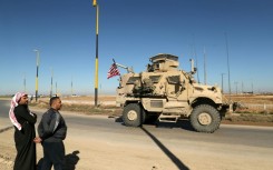 A US military vehicle in northeastern Syria driving towards the Iraqi border