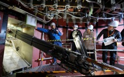 The snake-like robot arm measures 22 metres and weighs about 4.6 tonnes