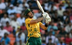 South Africa's captain Aiden Markram watches the ball after playing a shot against the West Indies in Ahmedabad