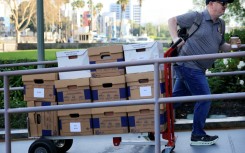 Boxes of documents are taken into Los Angeles Superior Court for a landmark social media trial