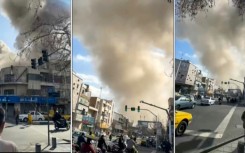 This combination of video grabs taken from UGC images posted on social media and verified by AFPTV teams show a repoted explosion in Tehran amid strikes by the United States and Israel