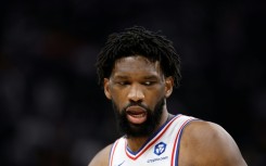 The Philadelphia 76ers say star center Joel Embiid will miss at least three games with an oblique strain
