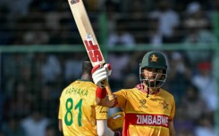 Zimbabwe's captain Sikandar Raza celebrates after scoring fifty against South Africa