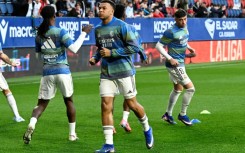 Kylian Mbappe (C) warming up before Real Madrid's recent game against Osasuna in La Liga