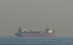 Qatar's state-run energy firm said it had halted liquefied natural gas production following Iranian attacks on facilities at two of its main gas processing bases