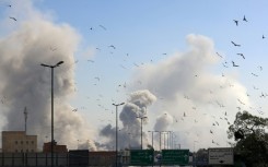 A plume of smoke rises after a strike on Tehran