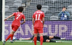 North Korea’s Myong Yu Jong scored a hat-trick against Uzbekistan