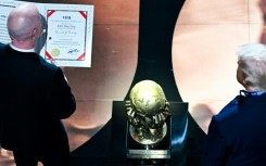FIFA President Gianni Infantino presents the newly-created FIFA Peace Prize to US President Donald Trump at the World Cup draw